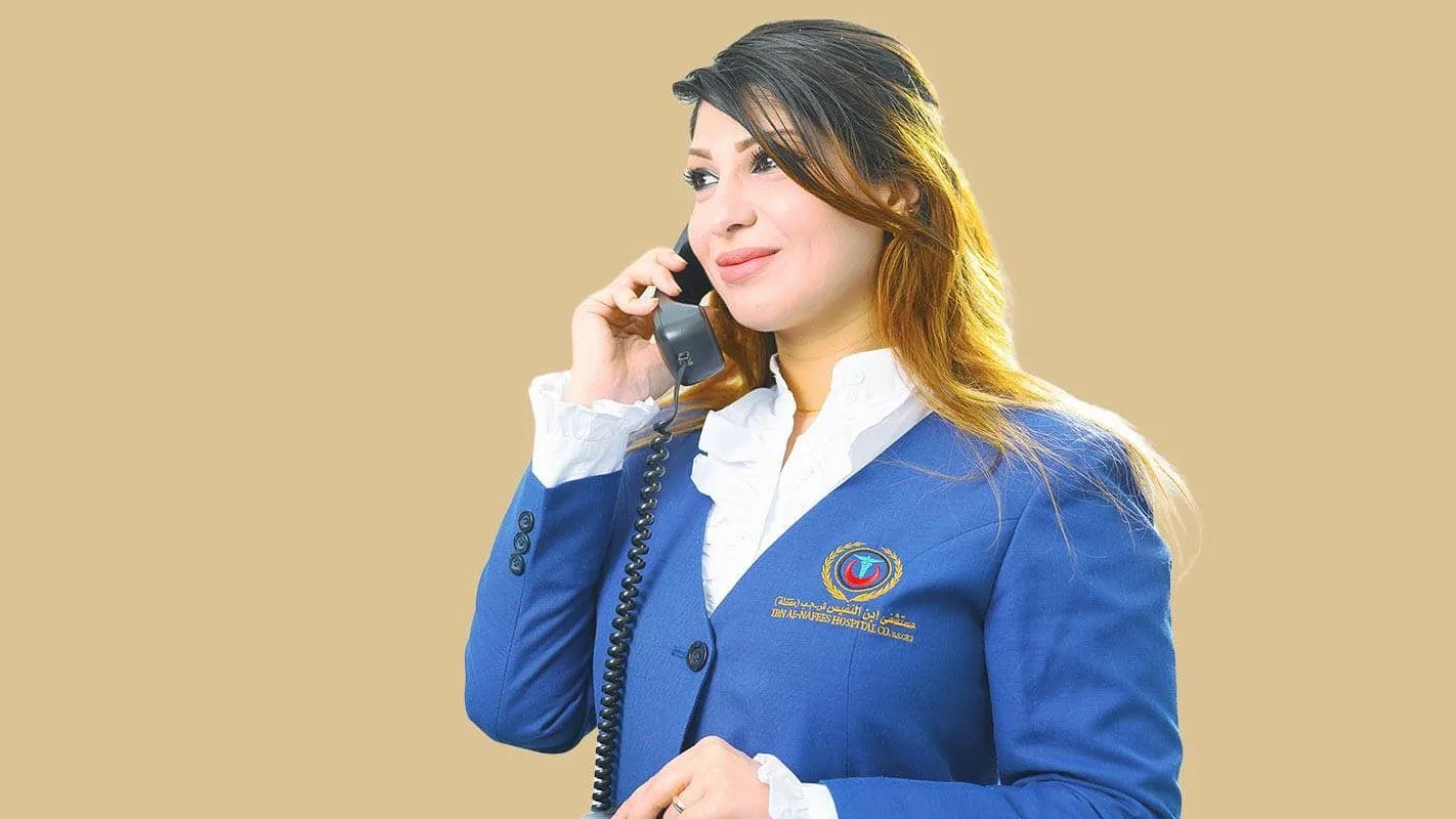 Ibn Al-Nafees receptionist taking an appointment call