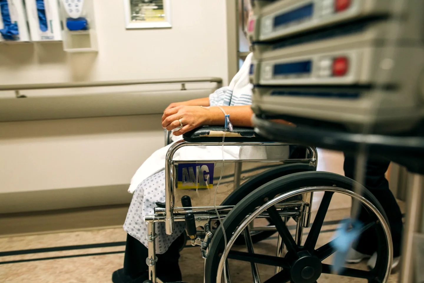 Patient using a wheelchair in a hospital room