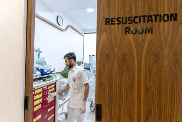 Nurse at the entrance to the resuscitation room
